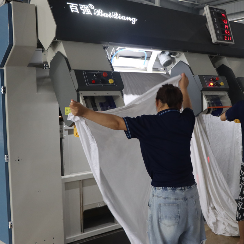 布草洗滌公司燙平機(jī)輸送前端有必要用展布機(jī)嗎？